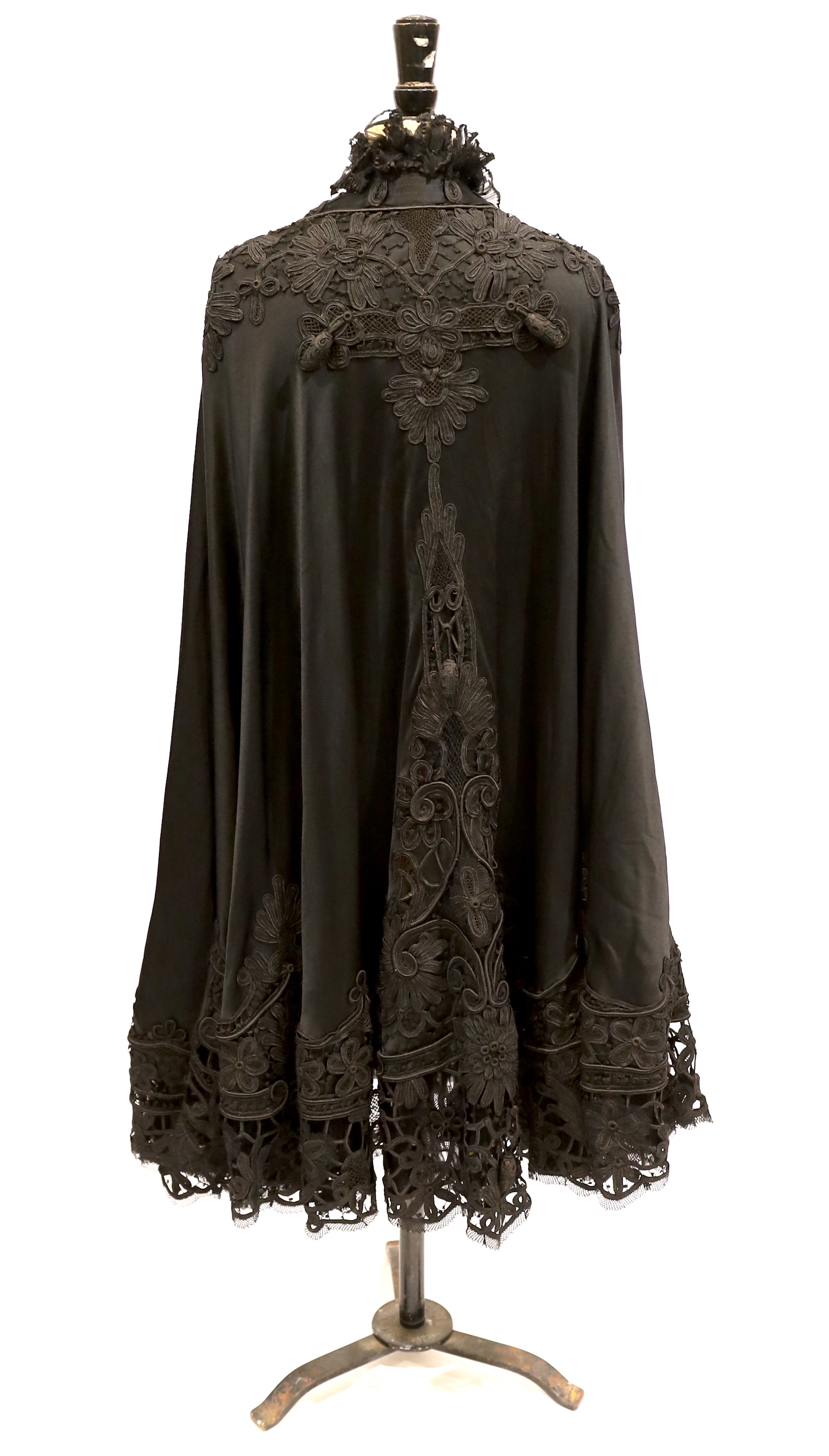 A Victorian black silk and tape lace opera cape, with black pleated chiffon collar
